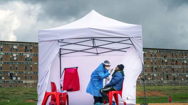 A resident from the Alexandra township gets tested for COVID-19 , in Johannesburg, 