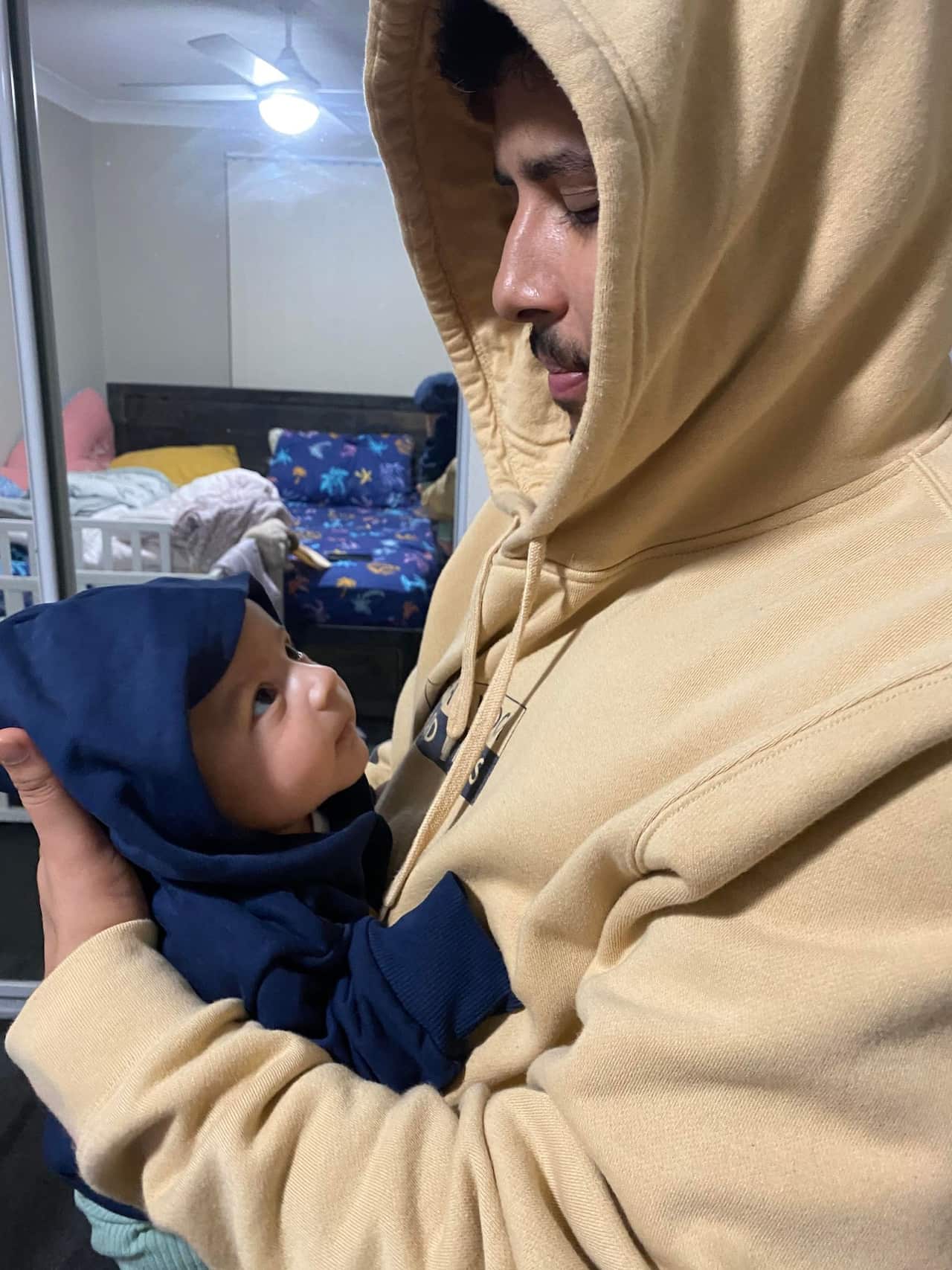 Ashim Gautam with his son