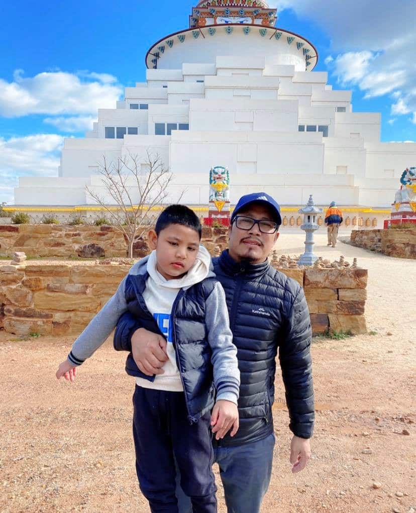 Raj Kumar Prajapati with his son