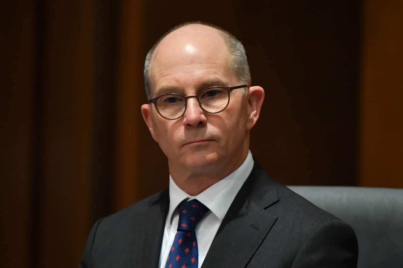 Acting Chief Medical Officer Paul Kelly at a press conference at Parliament House in Canberra, on 11 December.