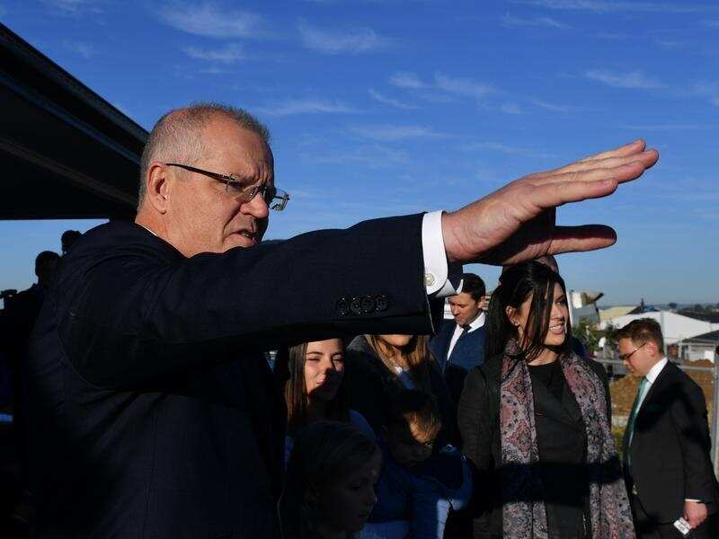 Prime Minister Scott Morrison at a housing construction site.