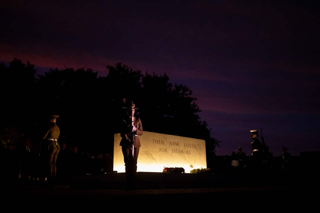 Australia's Federation Guard Catafalque party on guard at the Stone of Remembrance during the Anzac Day Dawn Service at the Australian War Memorial in Canberra