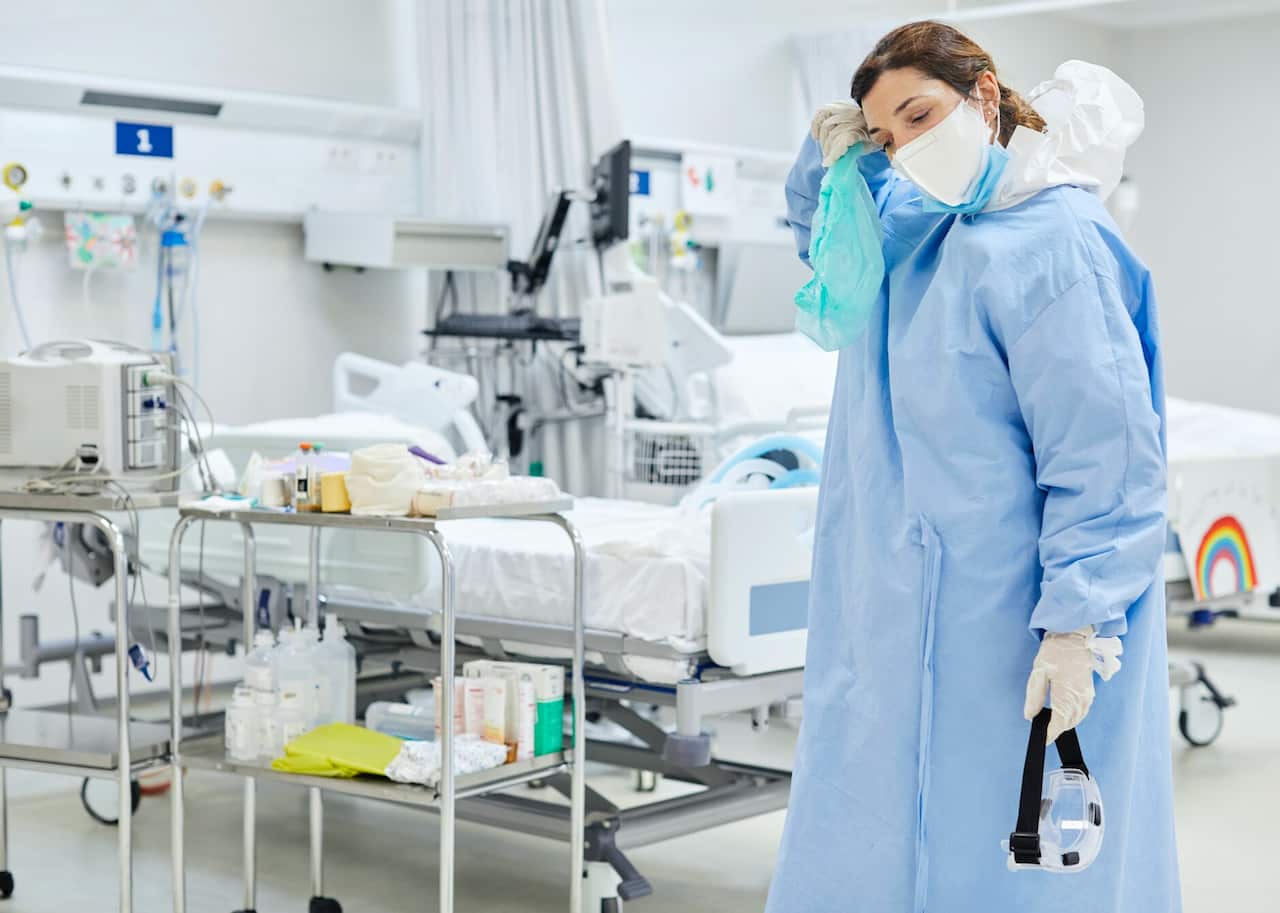 Health care worker in PPE.