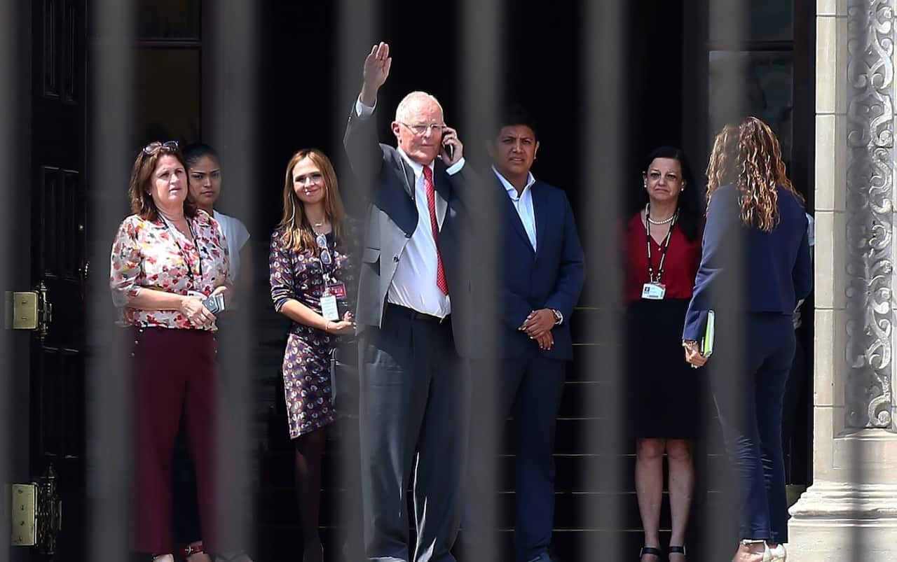 Peruvian President Pedro Pablo Kuczynski leaves the Government Palace after bidding farewell