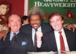 Dec. 1987 file photo, Donald Trump, right, pictured with his father, Fred Trump, left, and boxing promoter Don King. AAP