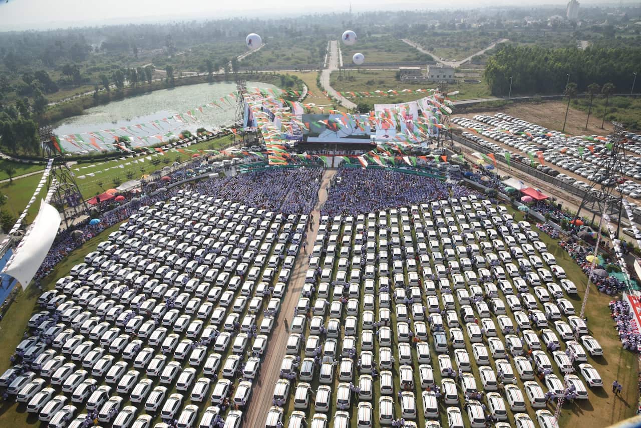 Employees were handed over car keys at an event in Surat.