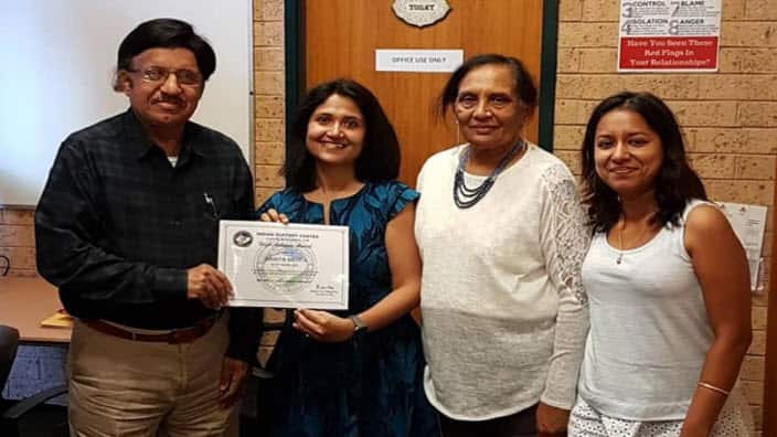 Harita Mehta (2nd left) received an award for her contribution to covering domestic violence stories. 