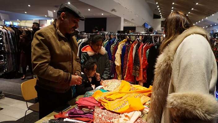People buying Eid clothes at Eid Festival in Sydney