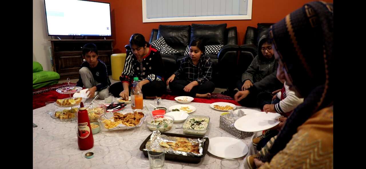 A Muslim family in Sydney enjoying iftar during Ramadan.