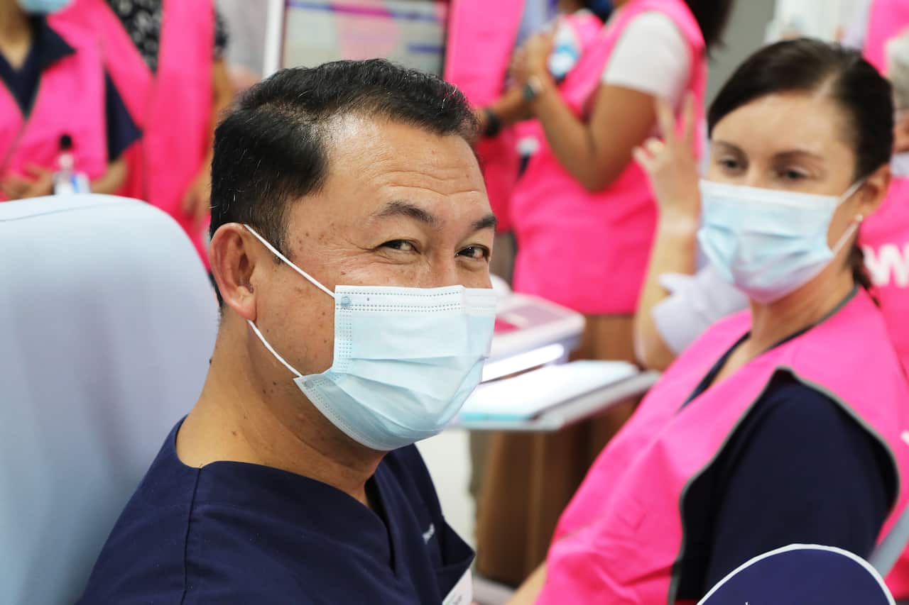 Westmead Vaccination Hub vaccination starts. Left to right: Dante Canete (Num), Carly Hanington (Reg Nurse)