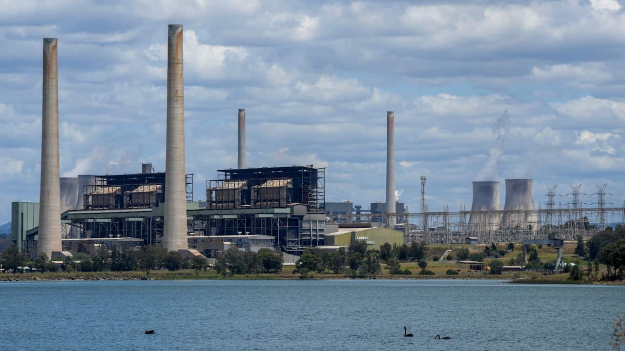 Liddell Power Station, left, and Bayswater Power Station, right, coal-powered thermal power stations near Muswellbrook in the Hunter Valley, Australia, Tuesday, Nov. 2, 2021.