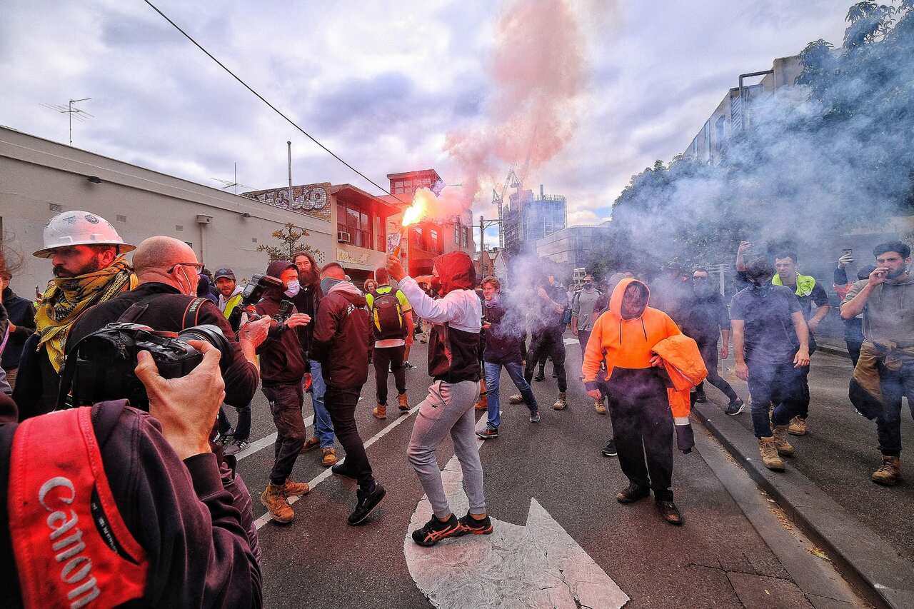Protesters are seen in Melbourne, Wednesday, 22 September, 2021. 