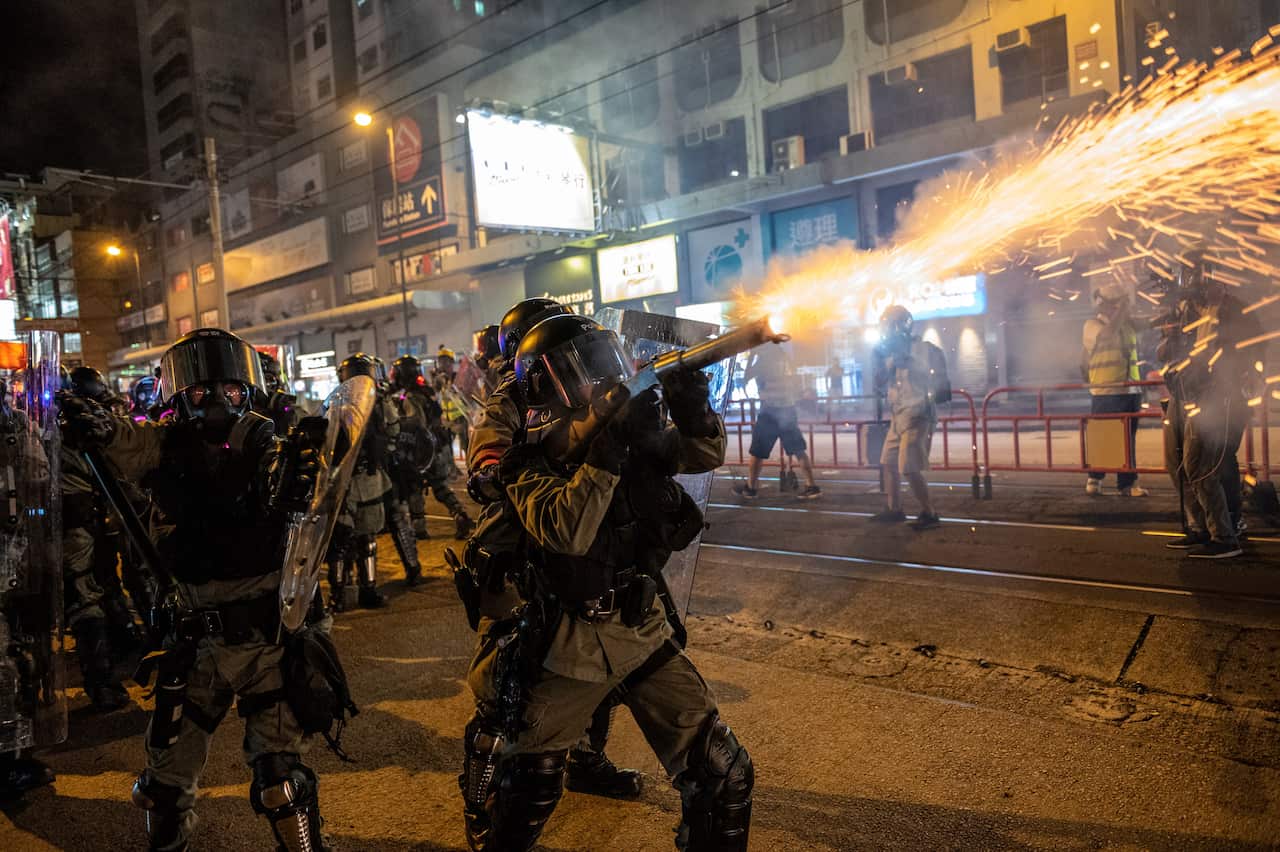 Police fire tear gas at protesters after thousands of pro-democracy activists hit the streets of Tuen Mun.