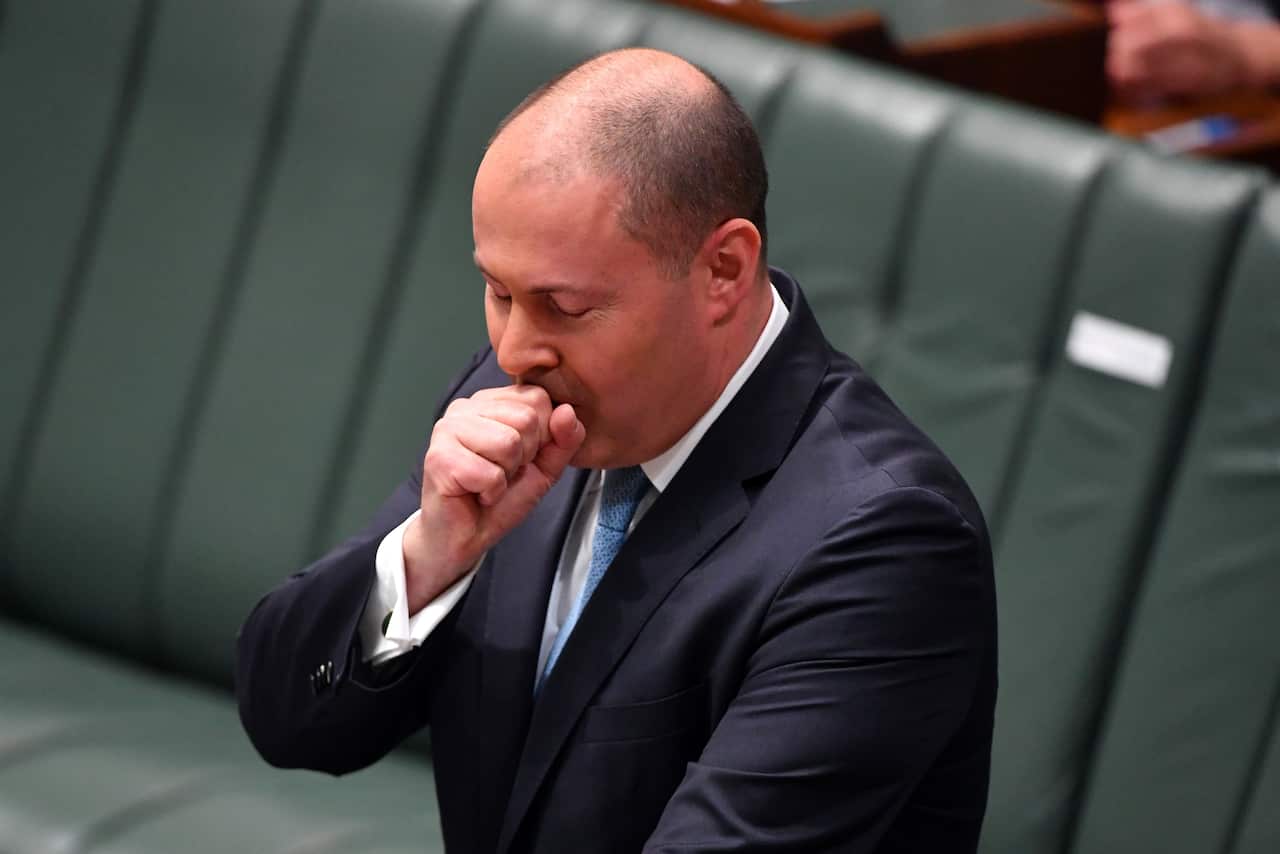 Treasurer Josh Frydenberg has a coughing fit as he makes a ministerial statement to the House of Representatives at Parliament House in Canberra, Tuesday, May 12, 2020. (AAP Image/Mick Tsikas) NO ARCHIVING