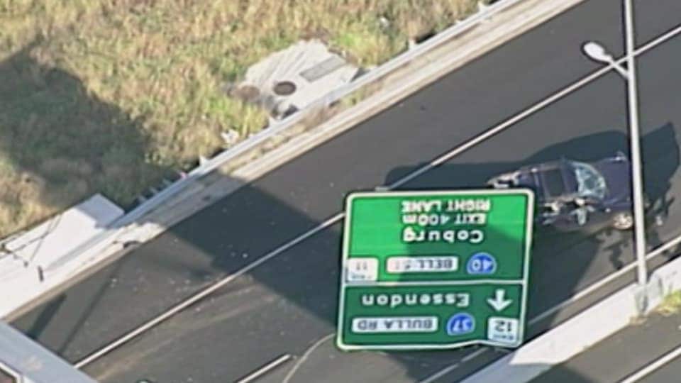 The crumpled sign on the Tullamarine Freeway.