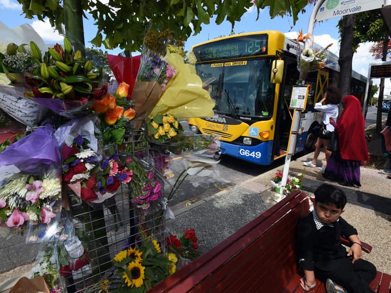 A floral tribute is seen at a bus stop in Morooka