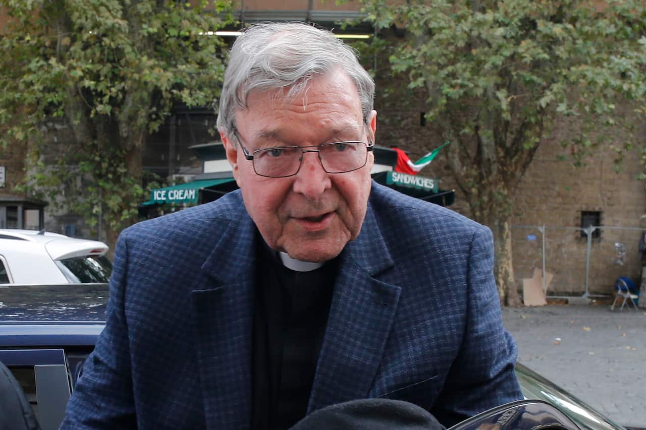 Cardinal George Pell arrives at his residence in Rome, Italy.