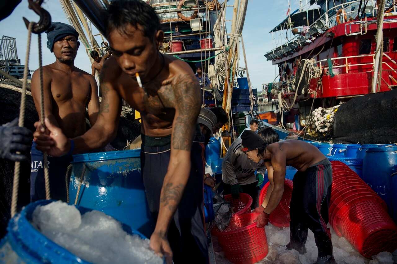 Migrant workers on a fishing boat Phuket, Thailand. Thailand's fishing industry is rife with slave labour.