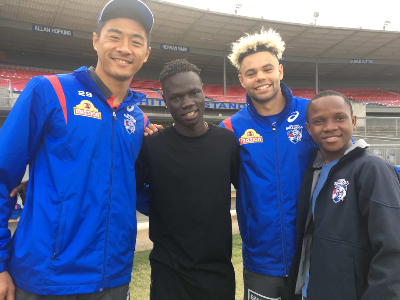 Western Bulldogs players with 'Ready, Settle, Go' participants