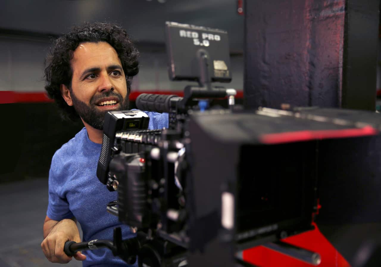 Director Ali Musawi Al-Ahwazi (AM)