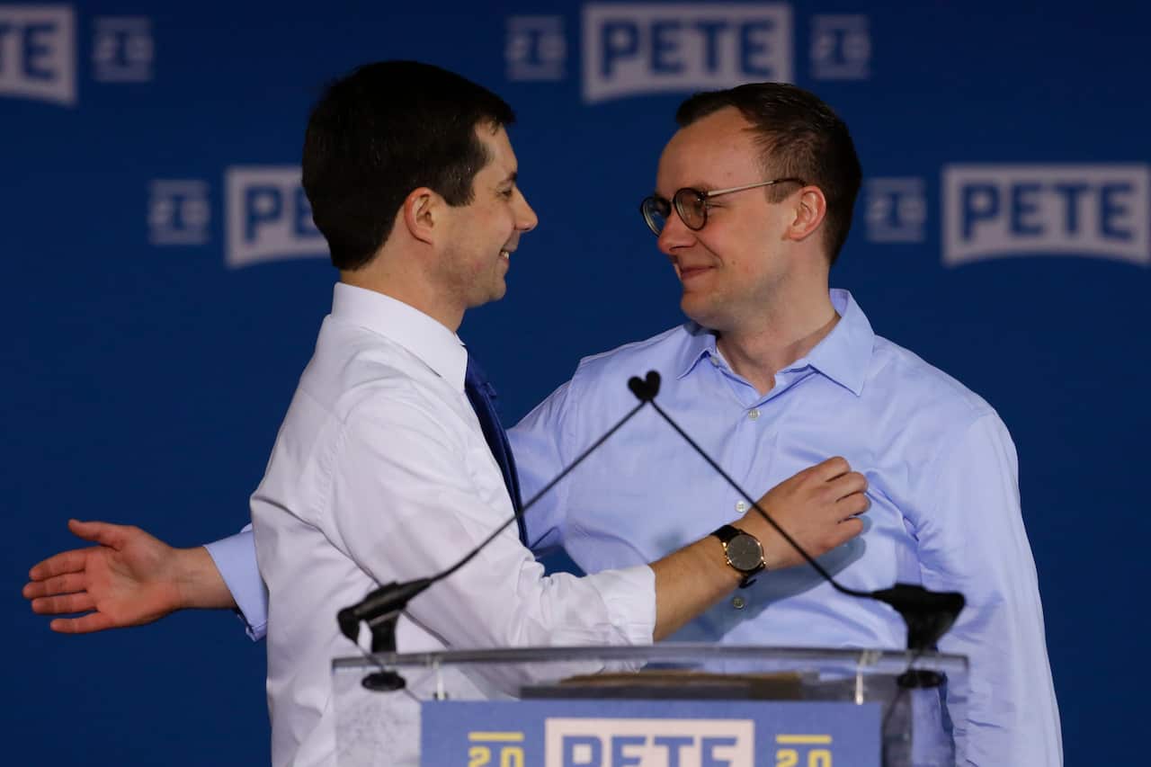 Pete Buttigieg is joined by his husband Chasten Glezman in 2019.