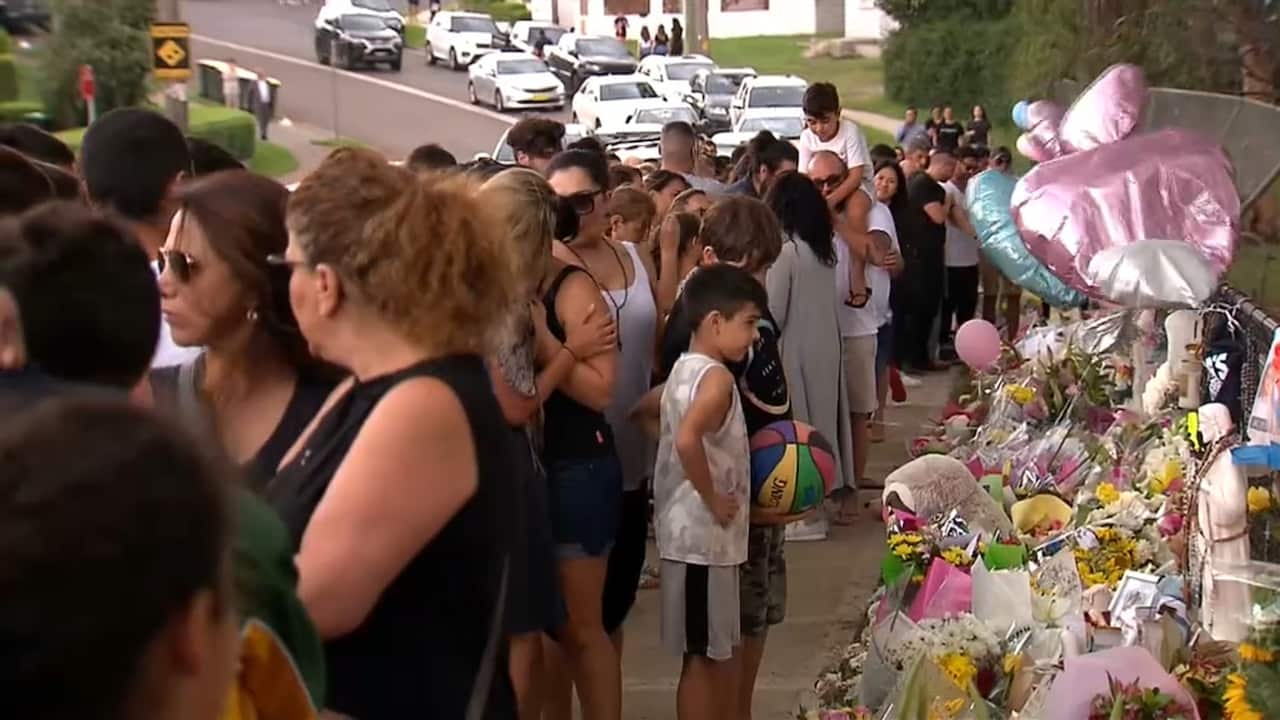 Hundreds gathered for the prayer vigil held to remember the four children killed. 