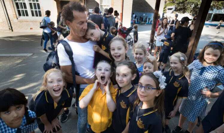 P&C president Rob Keldoulis with his son Archie and other students at Bondi Beach Public School.