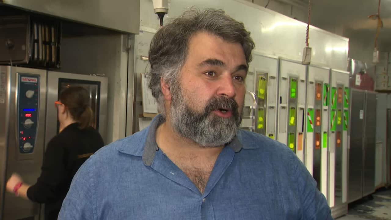 Asylum Seeker Resource Centre CEO Kon Karapanagiotidis at the organisation's catering headquarters