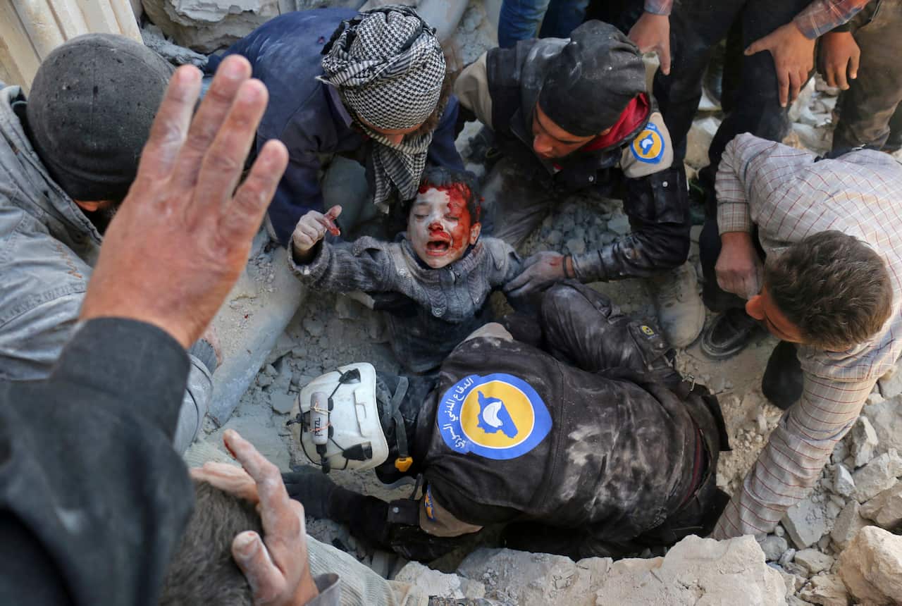 "Rescued From The Rubble" shows Syrian civil defense volunteers, aka White Helmets, rescuing a boy from the rubble following a reported barrel bomb attack.