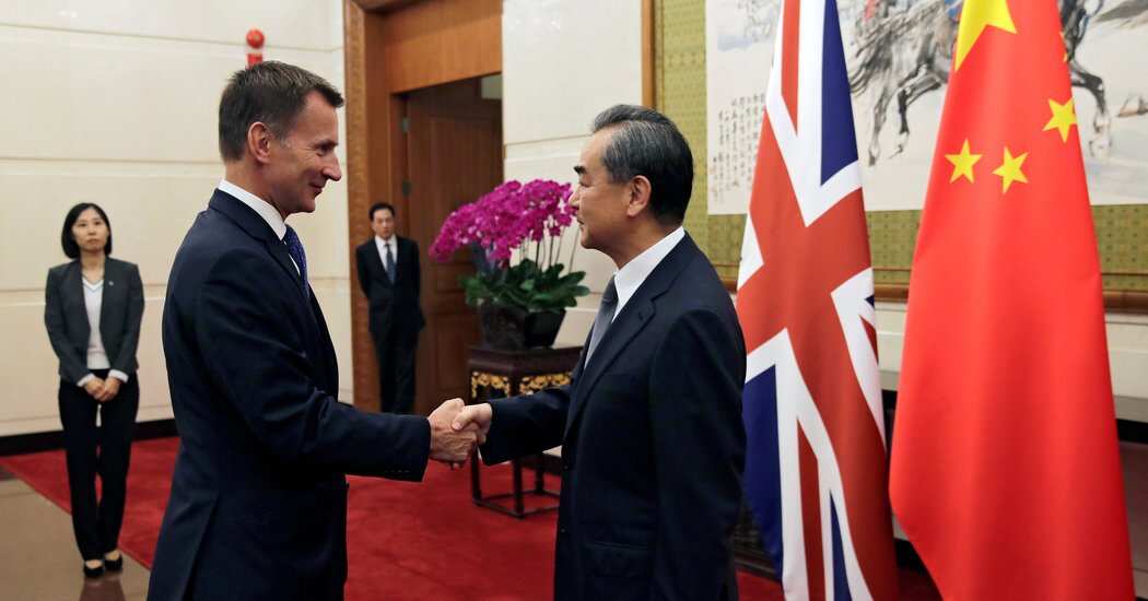 Jeremy Hunt and Wang Yi