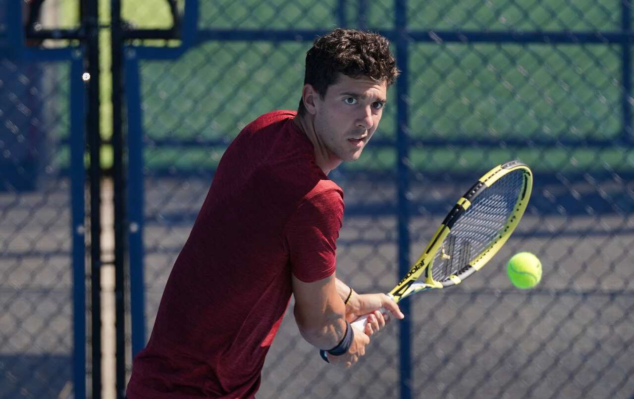 Thanasi Kokkinakis of Australia during a practice session at Xavier College Tennis Courts in preparation for the Australian Open 2021. 
