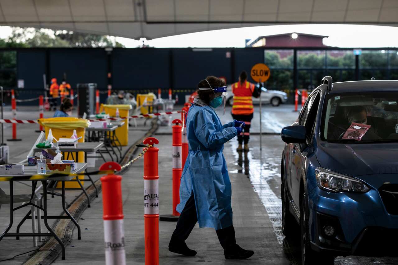 A health worker at a COVID-19 testing site at Ascot Vale in Melbourne