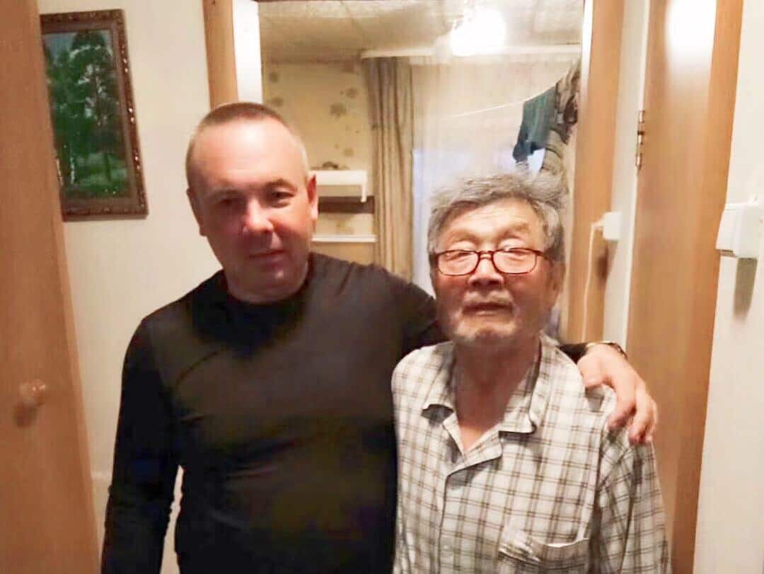 Mr. Wu and Russian trailer driver