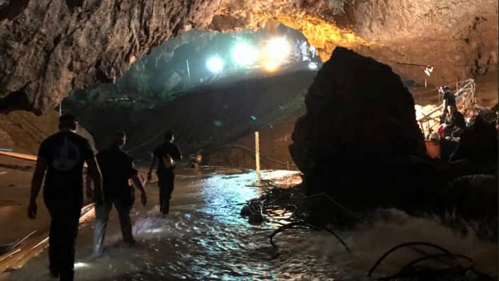 Efforts are underway to rescue trapped members of a youth football team from a flooded cave in northern Thailand.