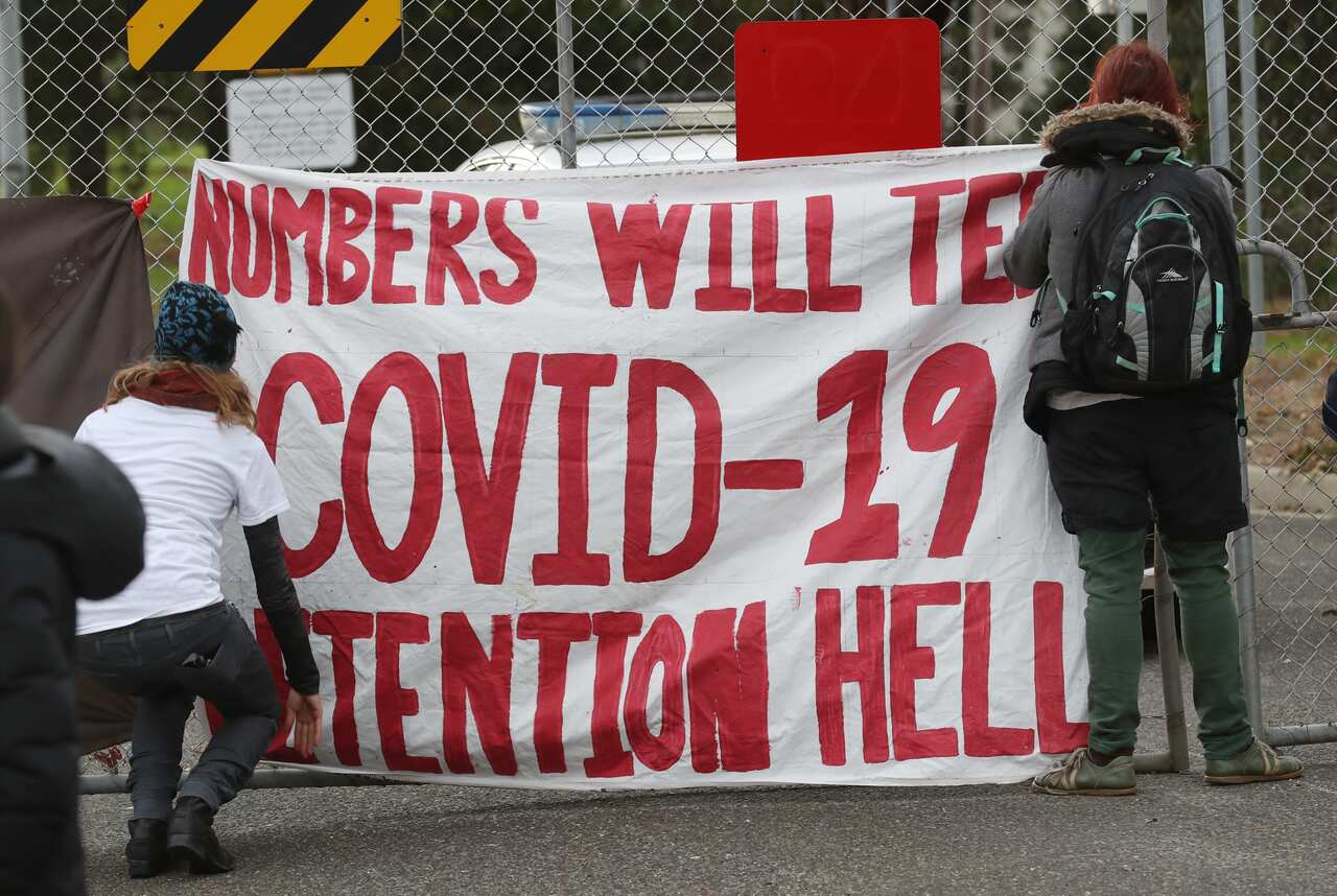 Protesters at the Melbourne Immigration Transit Accommodation Centre in Melbourne in June 2020.