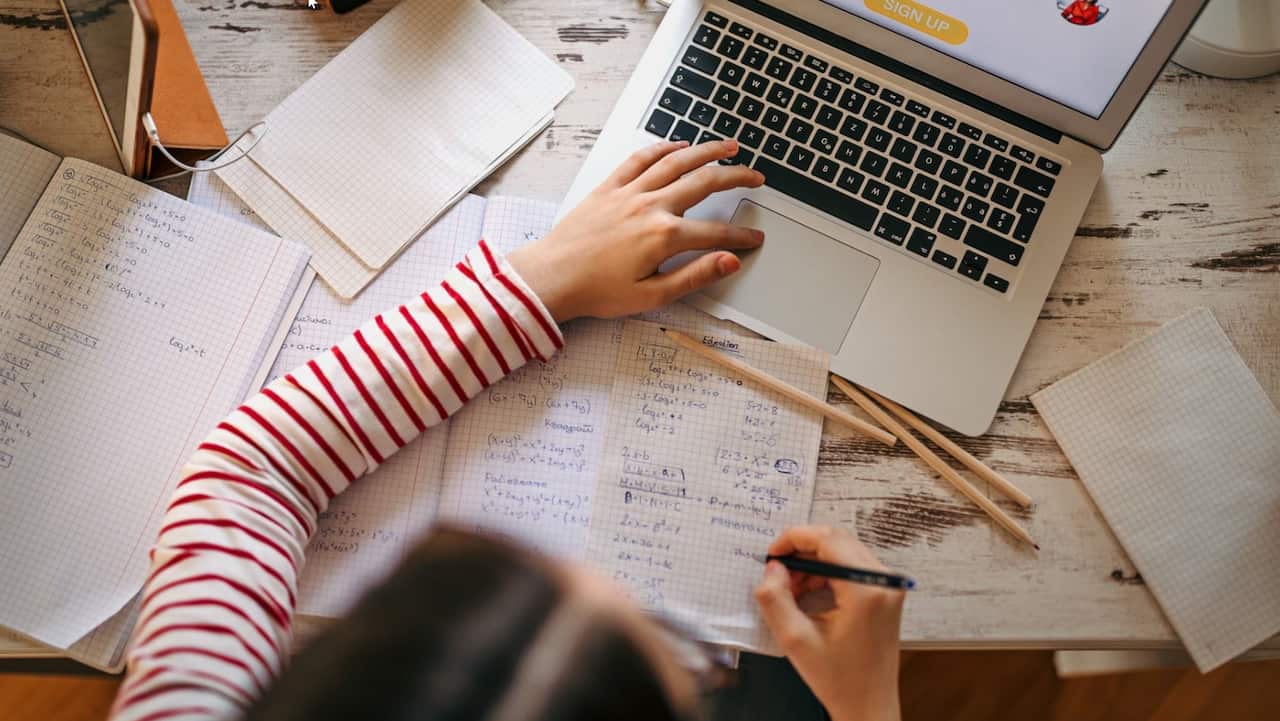laptop on desk aerial