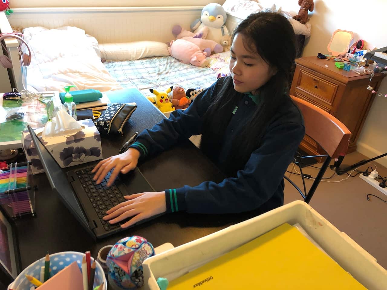 Melissa Lin taking online class from home