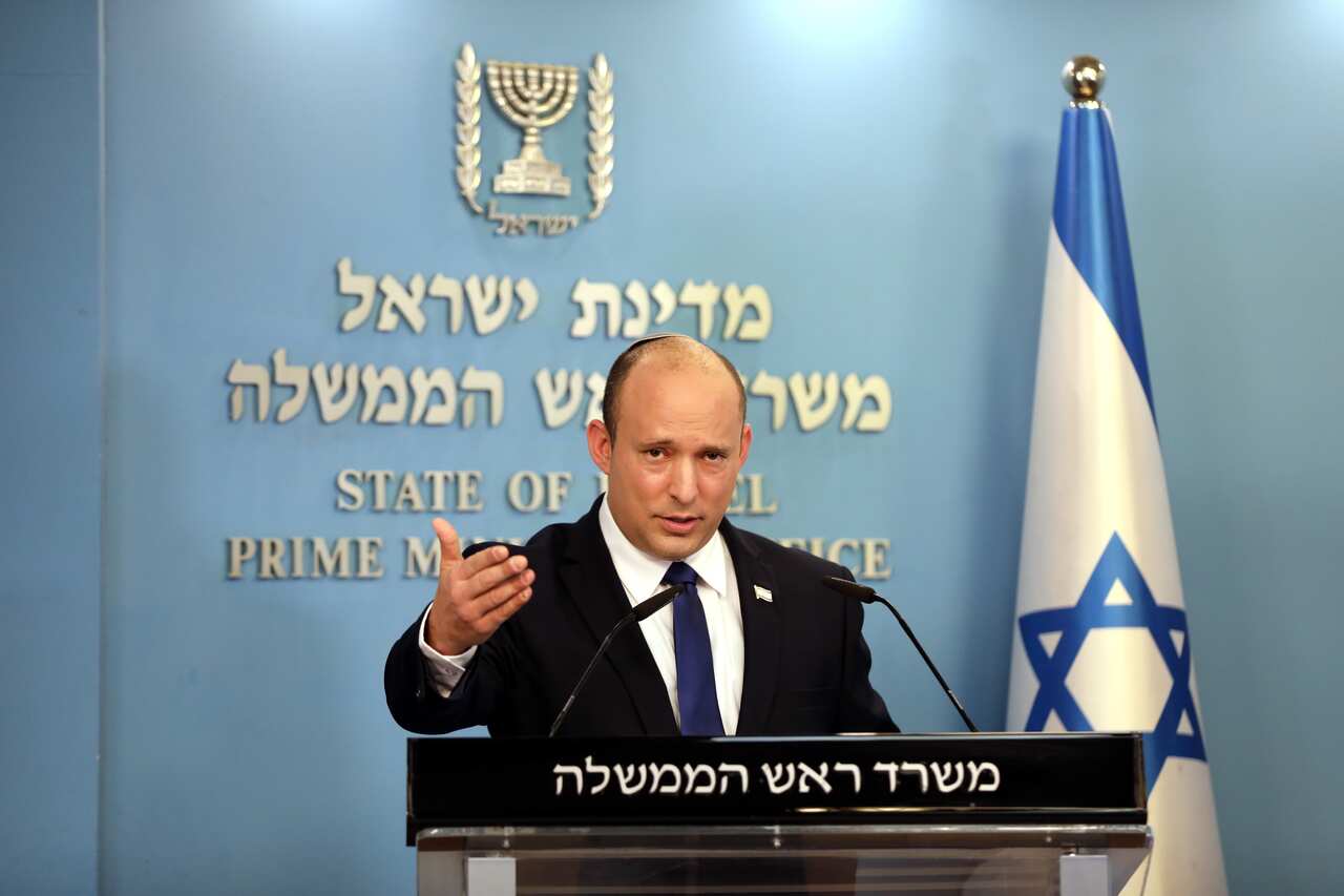 Prime Minister Naftali Bennett speaks during a press conference regarding the COVID-19 situation in Israel.