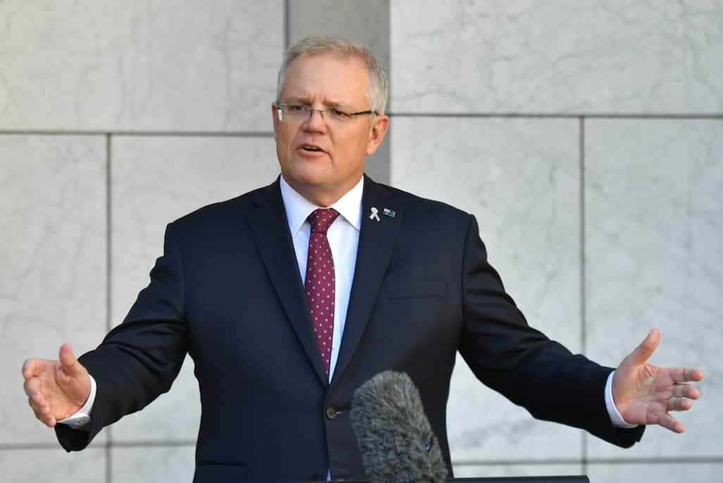 Prime Minister Scott Morrison talks to reporters on Thursday.