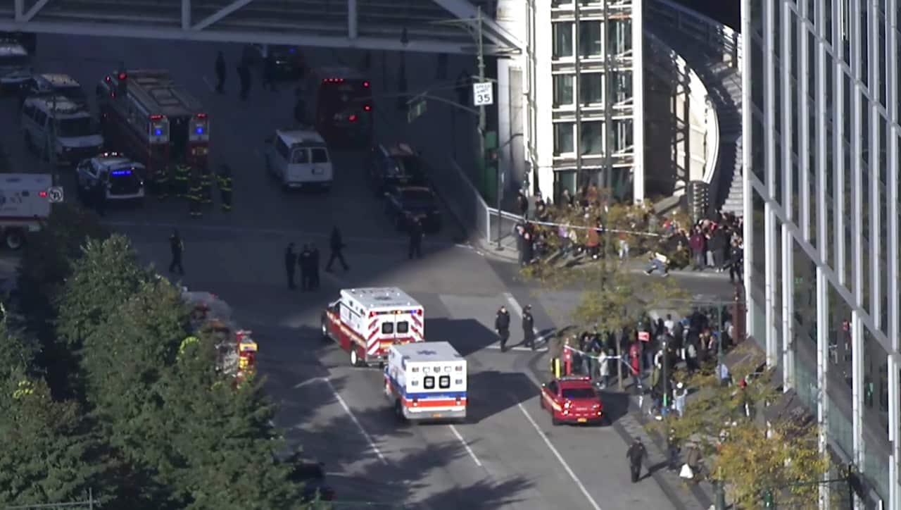 In this still image taken from video, police and ambulances respond to report of gunfire a few blocks from the World Trade Center in New York on Oct 31