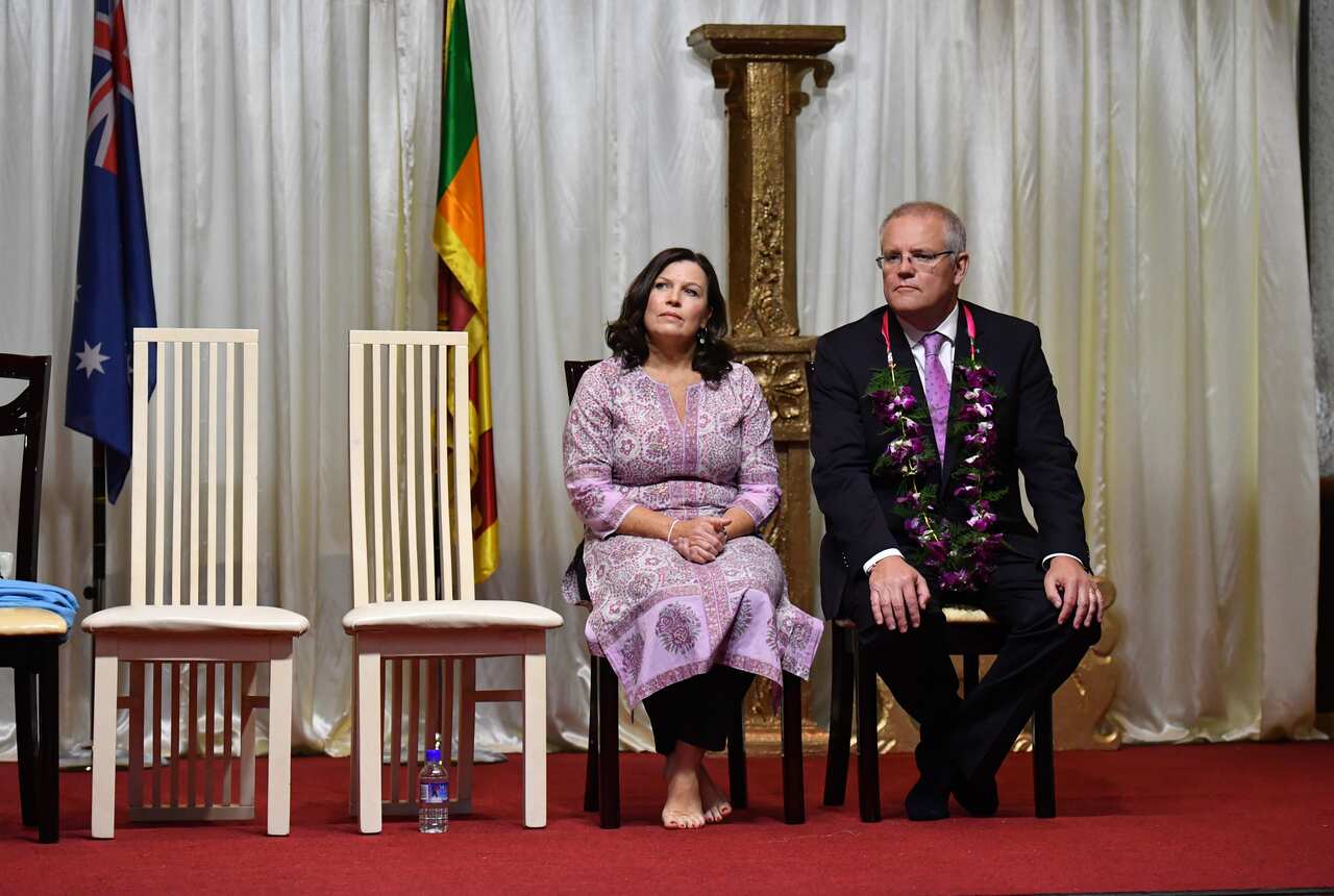 Prime Minister Scott Morrison and wife Jenny visit the Sakyamuni Sambuddha Vihara, Sri Lankan Buddhist Temple, in Berwick in Melbourne, Monday, April 22, 2019. (AAP Image/Mick Tsikas) NO ARCHIVING