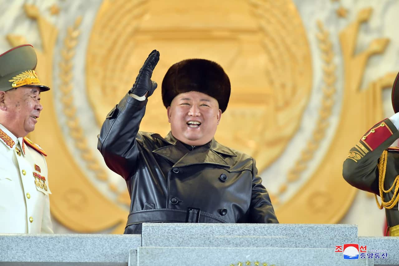 North Korean leader Kim Jong-un reacting during the military parade