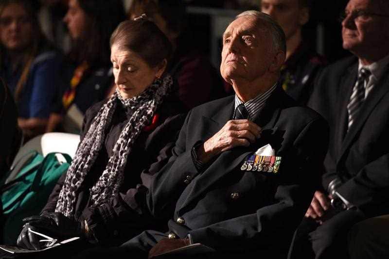 An ex-serviceman waches on during the Anzac Day dawn service in Sydney, Monday, April 25, 2016. 