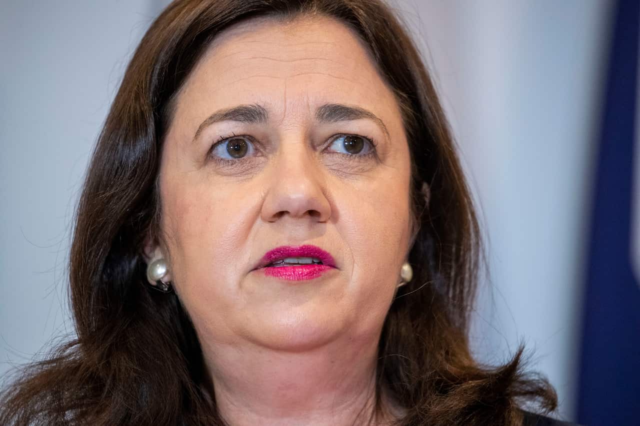 Queensland Premier Annastacia Palaszczuk urges travellers to delay plans if possible.