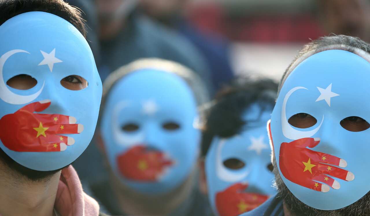 Demonstrators protest against China in Istanbul, Turkey, in an effort to highlight the critical situation of alleged human rights abuses of the Uyghur people.