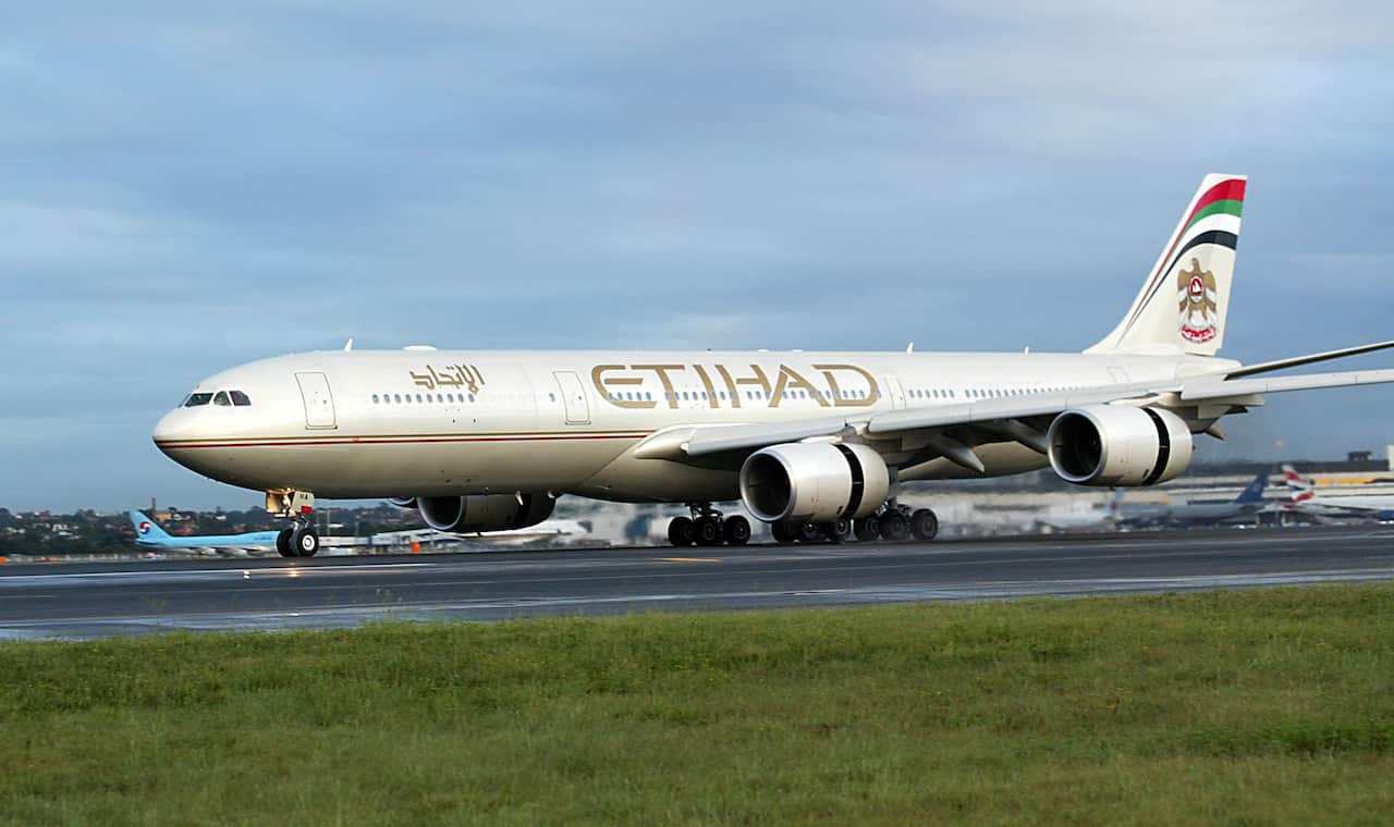 A file photo of a a Etihad Airways plane landing in Sydney.