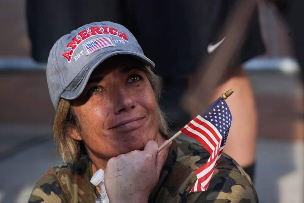 A Trump supporter looks on outside the Pennsylvania Convention Cent after Joe Biden was declared winner of the 2020 presidential election. 