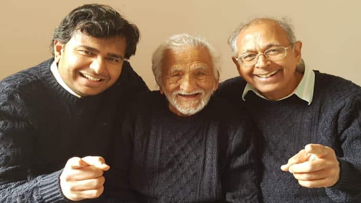 Shankerlal Trivedi with his grandson (L) and son Jagdishbhai (R).
