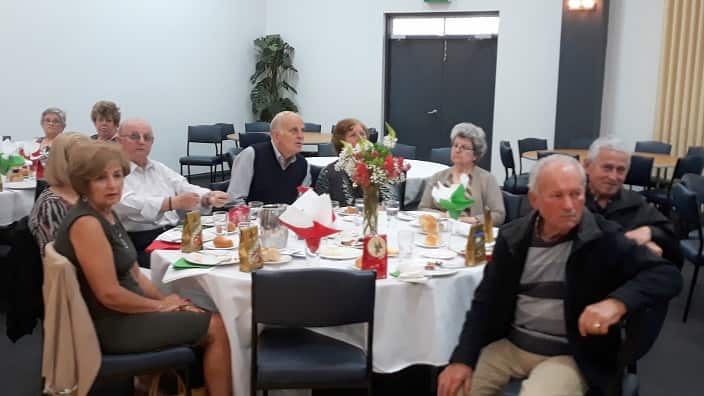 At Pronia's Christmas luncheon for its volunteers. 