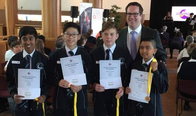 Ansh (R) with his team members